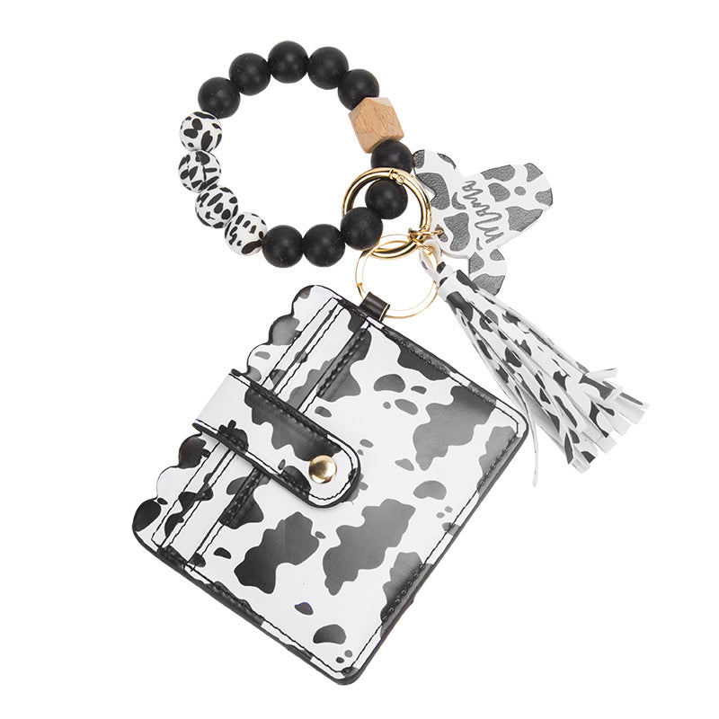 Venta al por mayor MAMA Cow Pattern Card Bag Silicona Beaded Wrist Key Chain